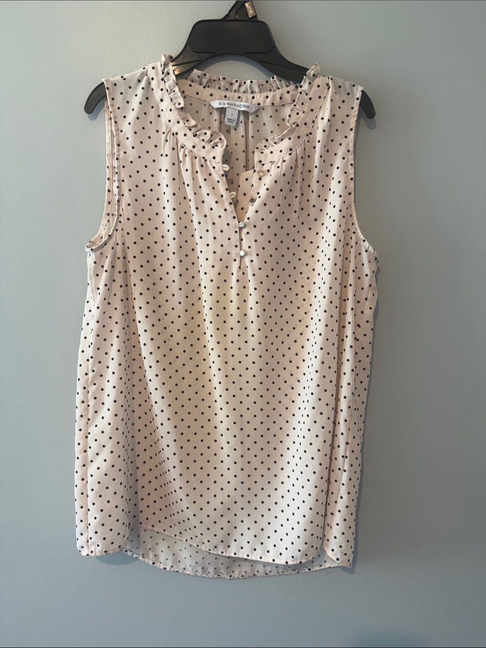 41 Hawthorn Cream and Black Polka Dot Sleeveless Ruffle-Neck Blouse